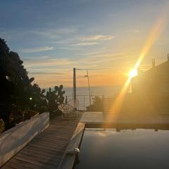 Haut de villa avec piscine au bord de mer