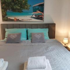 Apartament JK 47 A z miejscem postojowym w garażu