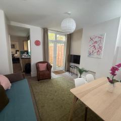 Central 2 bed flat with off street-parking