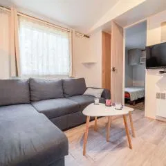 Mobil-home 2 chambres avec climatisation, terrasse et piscine à Mimizan - FR-1-50-162