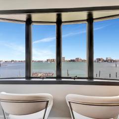 The Aura a Luxury Waterview Condo & heated pool