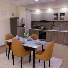 newly furnished apartment with swimming pool, fully equipped gym, private parking space,children playground and unbeatable scenic city views