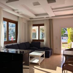 3-Bedroom Apartment on the Ground Floor with Pool View, Personal Garden Area, Backyard, and Free Beach Access in Sharm Hills Resort