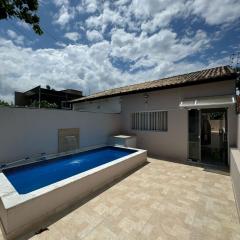 Casa em Itanhaém com Piscina e Ar condicionado à 900 Metros da Praia