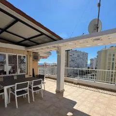 Ático con terraza y vistas al mar