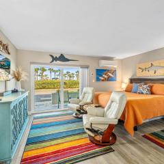 Vibrant and Colorful Studio STEPS from the Beach with Pool and Upgraded Kitchen!