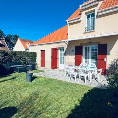Maison avec jardin dans résidence fermée