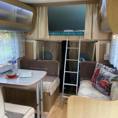 Camping-car au Charme de la Forêt avec jardin Accès à pied Circuit des 25 Bosses