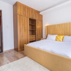 luxurious two bedroom apartment with well equipped gym ,heated swimming pool, ample parking space and a relaxing rooftop with amazing city views