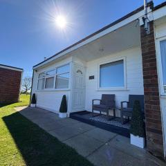 169 Sunbeach, Scratby - Two bed Chalet, sleeps 5, pet friendly, FREE pool and entertainment passes plus WiFi and linen and towels included