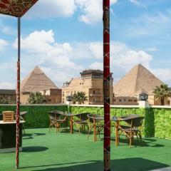 Tota nefertiti pyramids inn