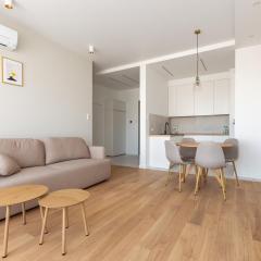 Stocznia Bright & Serene Riverside Apartments by BookingHost