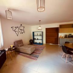 Charming little paradise steps away from the beach