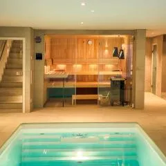 Dreamapartment La Vigna "White Suite" mit eigenem Indoorpool, Sauna & Grillhütte