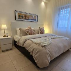 Modern One Bedroom with Steps from the Best Shops