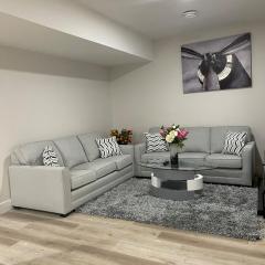 Modern suite in basement Upland
