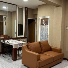 Apt 09 Puncak Dharmahusada 3BR Free Wifi Netflix