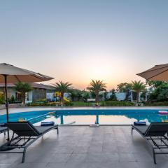 StayVista at The Grand Ten with lawn and pool