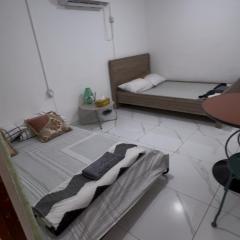 Js lodge studio type for 4 pax with tv kitchen and toilet