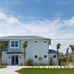 Riverfront Oasis with Ocean Views Steps from Car Free Beach 6090T