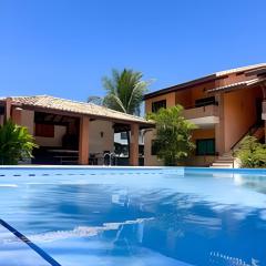 450m da PRAIA Taperapuan; 2 suítes; Piscina; WiFi 300 mbs; 2 pavimento; Churrasqueira; Estacionamento Gratuito 1 carro.