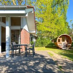 Ferienhaus Wiesengeflüster W3 - mit Fasssauna und Garten, 300 m zur Müritz