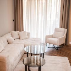 Ideal Apartments- Luxury Suites with Private Garage in City Center