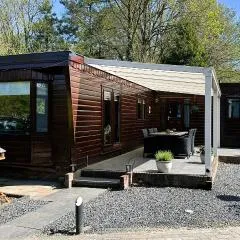Rustiek bos chalet Sven