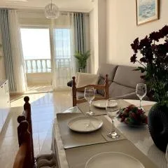 Beachfront apartment, sea view, pool, close to bars and restaurants