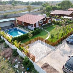 Kuku farm stay 3 bedroom wooden cottage with private pool at Moinabad