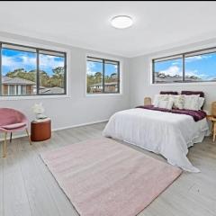 Center of Rouse Hill house with fully fenced back yard