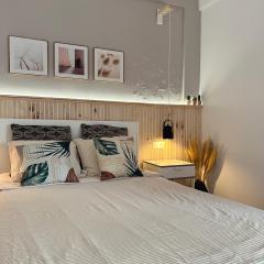 Quarto confortável com varanda