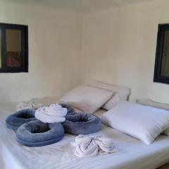 Second Floor Air-conditioned Room on Family Hut Bamboo House
