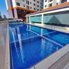 luxurious fully furnished two bedroom apartment with heated swimming pool fully equipped gym child play area and ample parking space and a relaxing rooftop with a breathtaking city views
