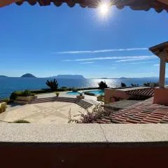 Luxury apartment Ginepro sea view with common swimming pool just 50 mt from the beach