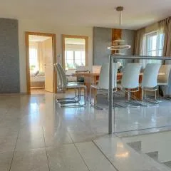 "GLÜCKSMOMENT" - Premium Apartments Seekirchen, beeindruckende Ferienwohnung mit gemeinsam genutzter Poolarea