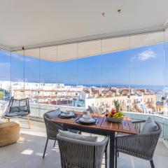 Terraza acristalada con vistas panorámicas