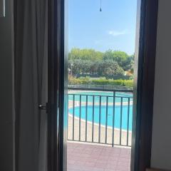 Casa Origine, appartamento vista piscina, al mare