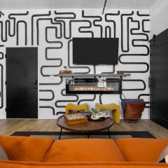 Eclectic Condo with Hot Tubs and E-Bikes