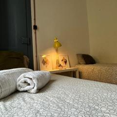 Low Cost Room - Double single bed with share bathroom