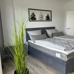 Fewo Schröder - Pier 5 - Strandkorb am Meer - seitlicher Meerblick - inklusiv Bettwäsche und Handtücher