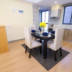 luxurious two bedroom apartment with well equipped gym,heated swimming pool, ample parking space and a relaxing rooftop with amazing city views