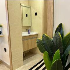 beautifully and elegantly furnished apartment with fully equipped gym, swimming pool ,private parking space ,,children playing ground and unbeatable city views in lavington