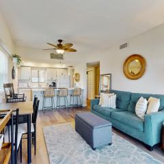 Modern oceanfront condo with outdoor pool, balcony, & washer/dryer