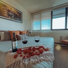 Garden 2BR Apt Steps from the Beach with Pool View