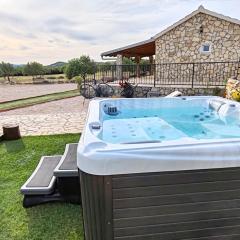 Holiday home Juli with JACUZZI