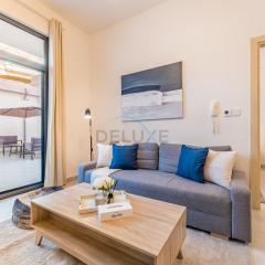 Terrace Overlooking the Pool 1BR, Just a Short Walk from the Park, Binghatti Mirage, Jumeirah Village Circle by Deluxe Holiday Homes