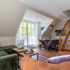 Ferienhaus Süderpiep – 4 individuelle Ferienwohnungen nahe Südstrand Ferienwohnung Möwe – stilvolle Maisonette für bis zu 4 Personen