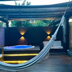 Uma Casa na Praia do Rosa com Jacuzzi