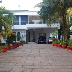 Dazicor Retreats - Luxury Villa in Kottarakara